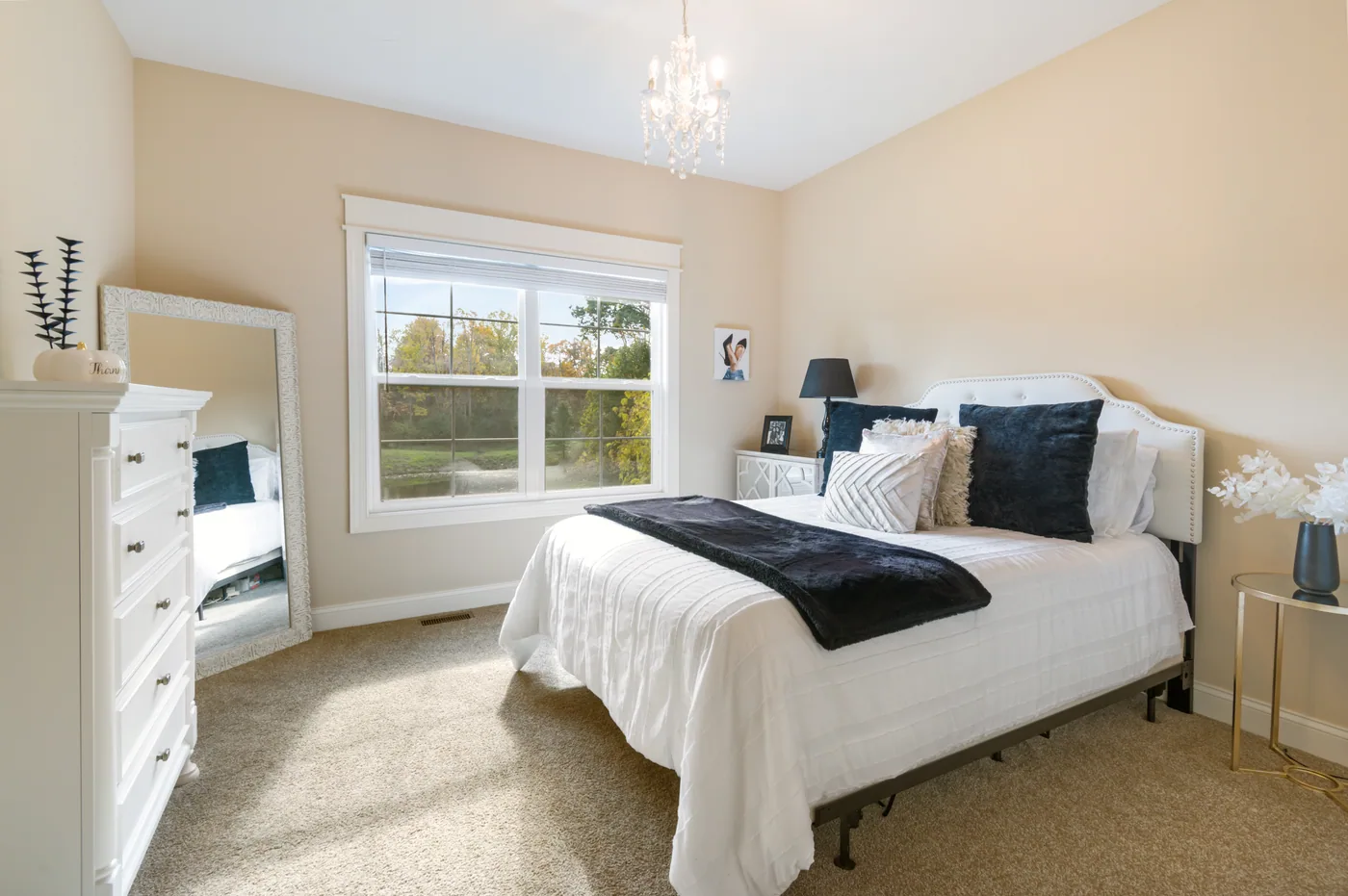 Bright staged bedroom photographed for a North Canton real estate listing